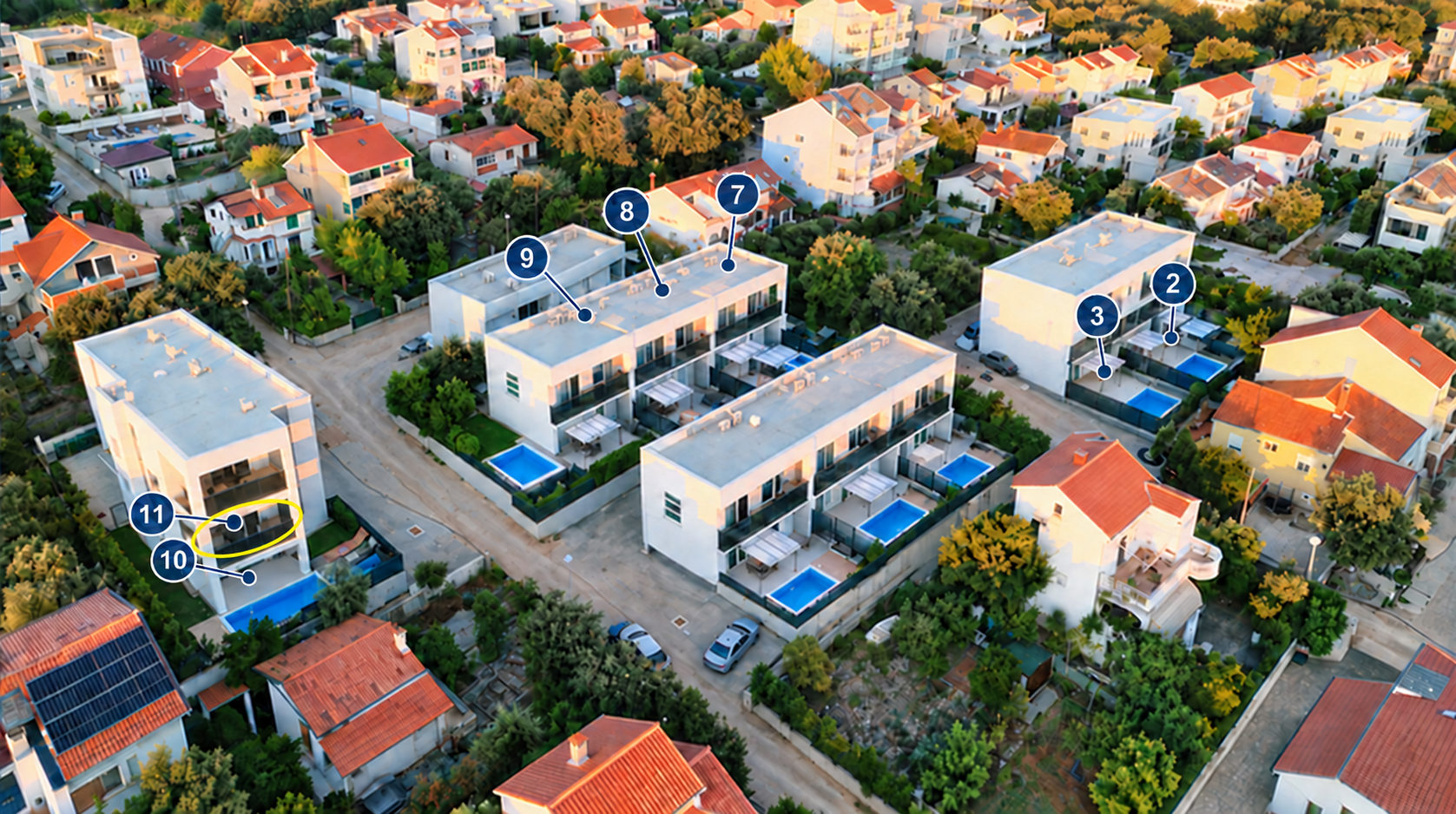 Aerial view with apartment 11 highlighted in yellow and all apartment numbers visible