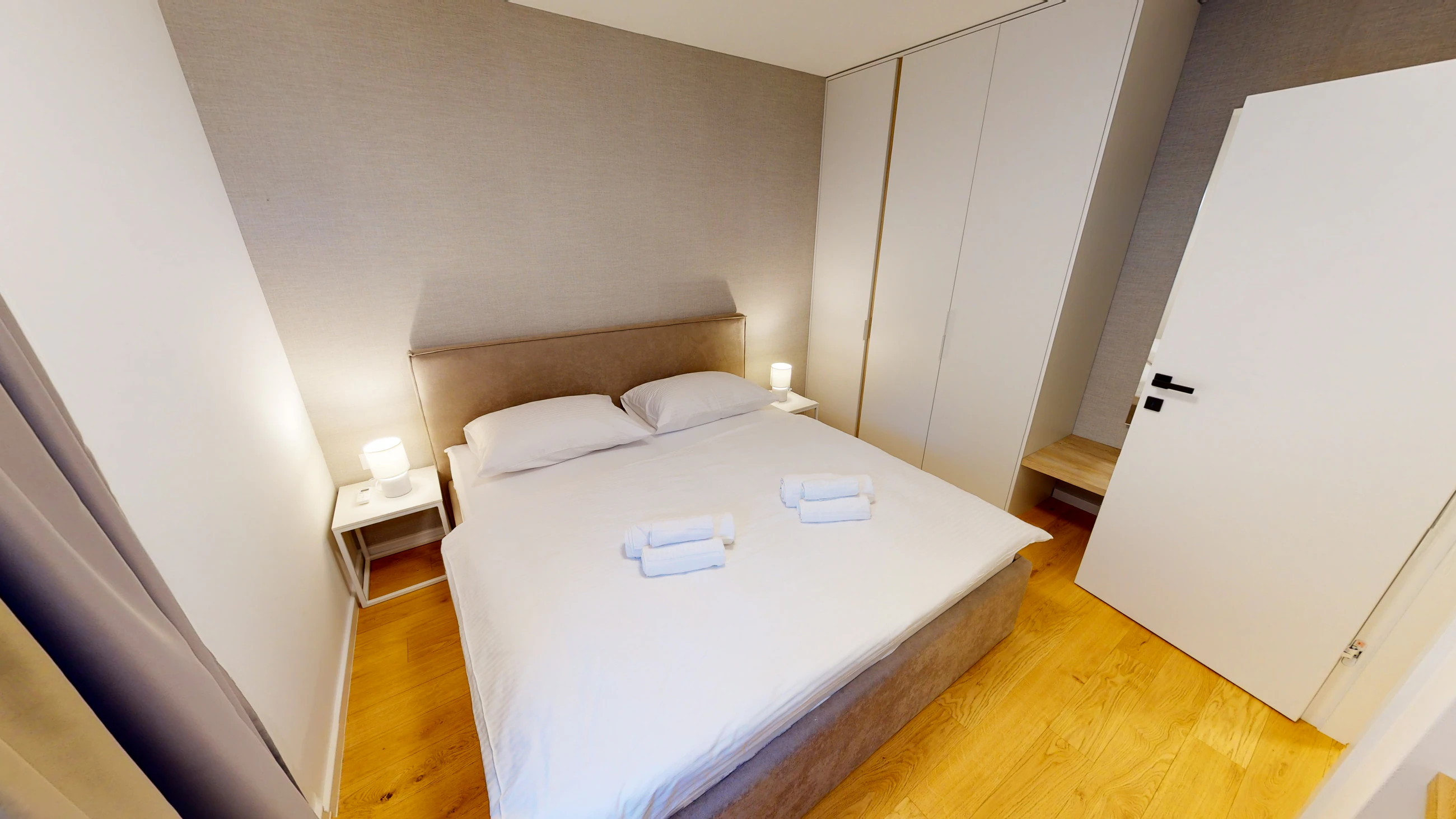 Second double bedroom at Three-Bedroom Apartment with Private Pool Near the Sea