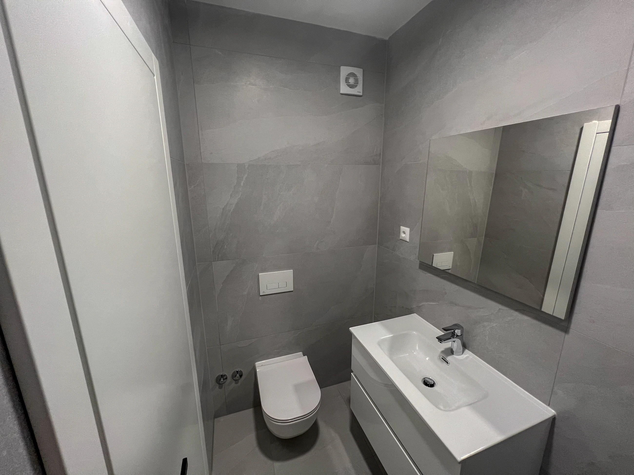 Second modern bathroom at Three-Bedroom Apartment with Private Pool Near the Sea