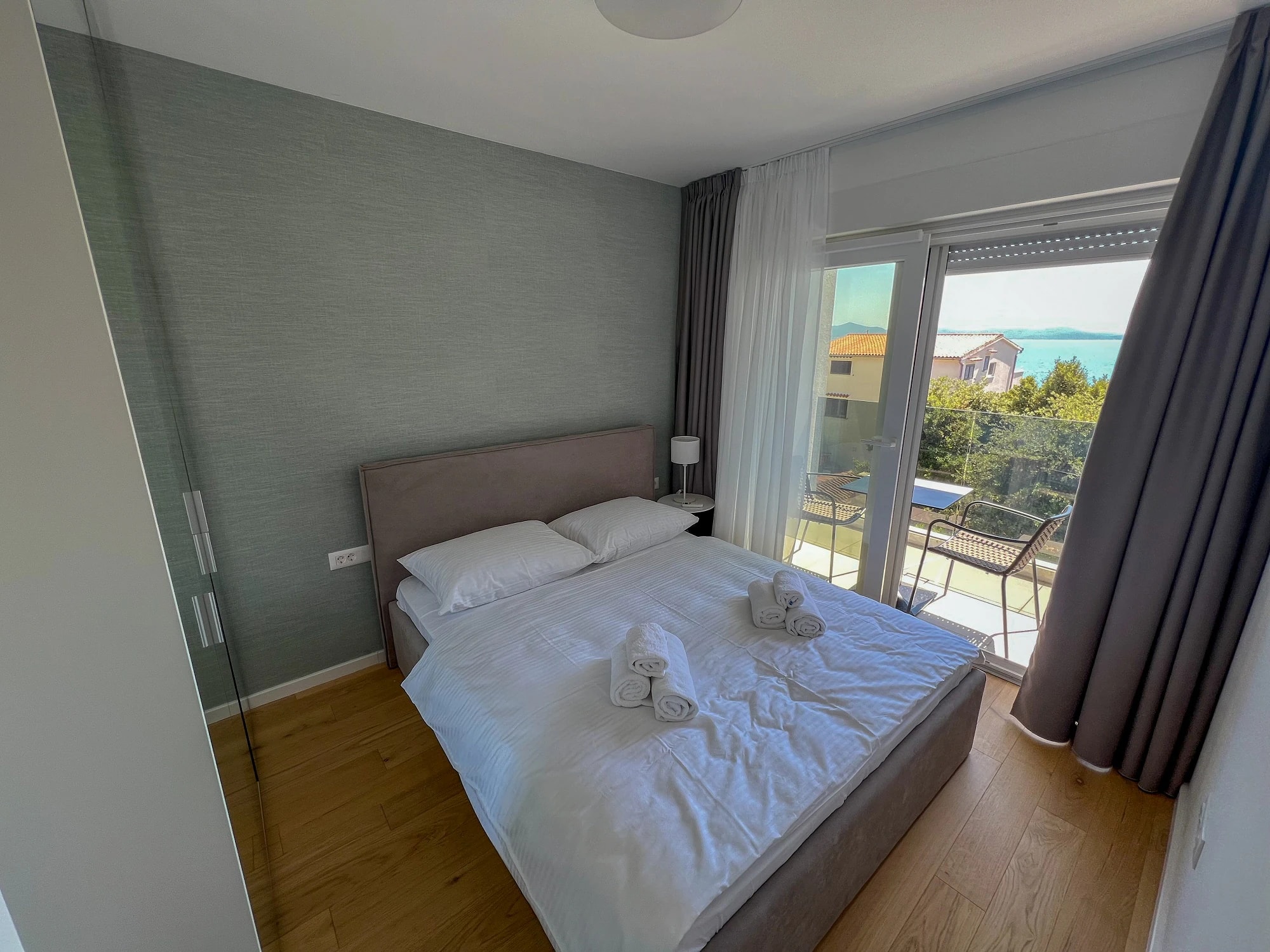 Second double bedroom at Three-Bedroom Apartment with Private Pool Near the Sea