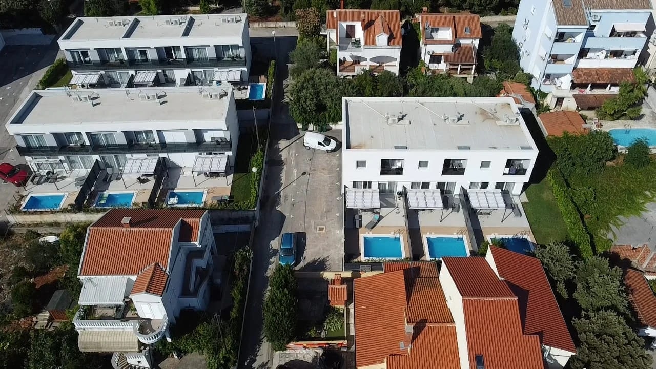 Aerial view of the private pools at Three-Bedroom Apartment with Private Pool Near the Sea