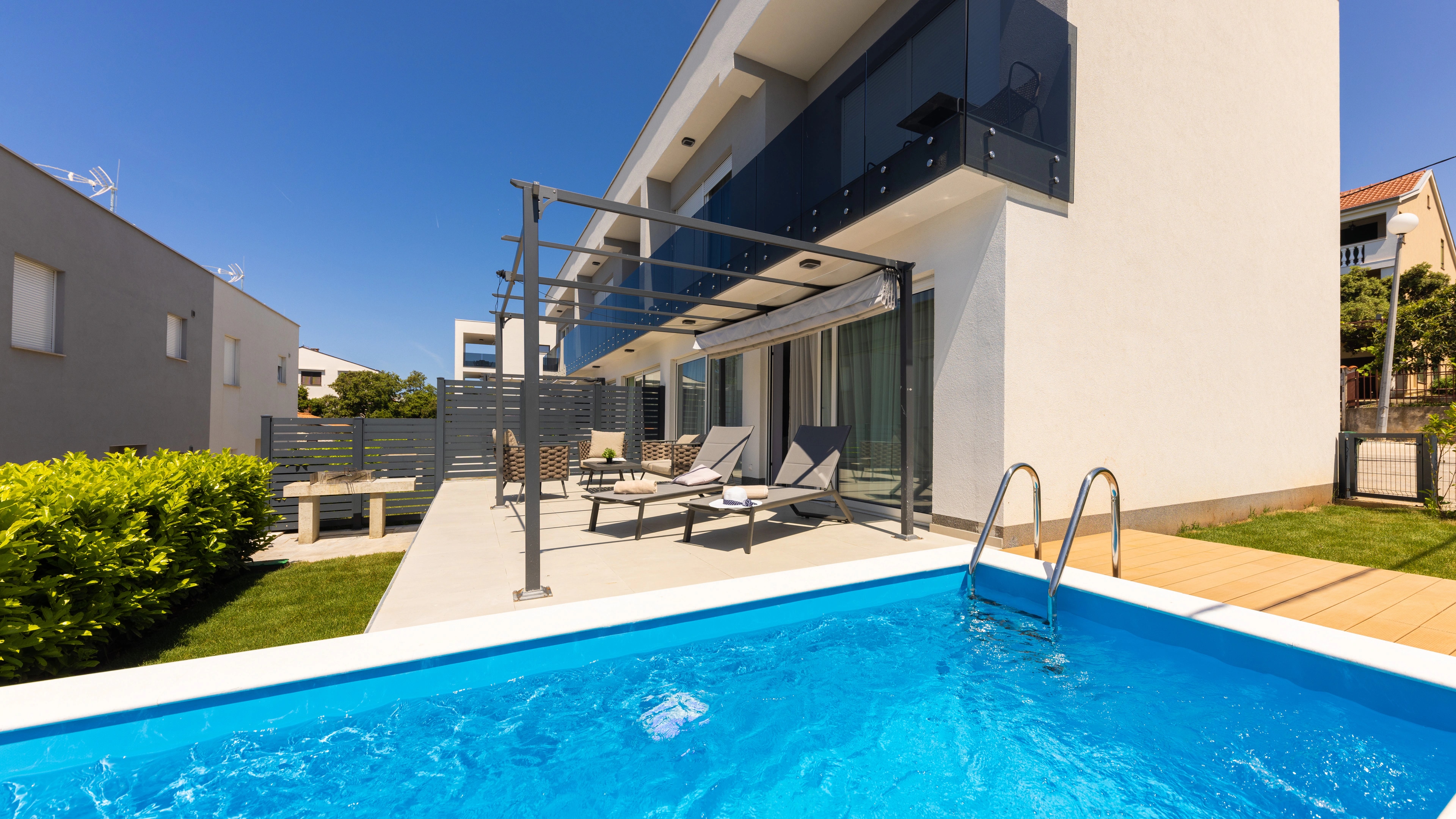 Private pool overlooking the Adriatic at Three-Bedroom Apartment with Private Pool Near the Sea