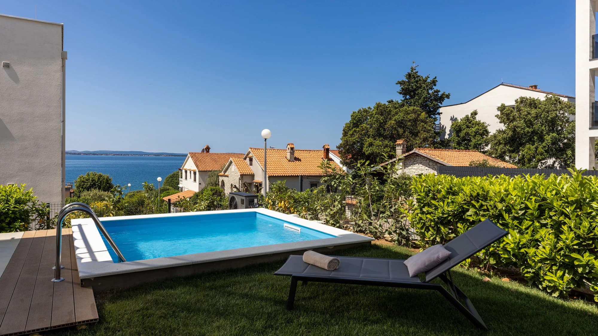 Private pool overlooking the Adriatic at Three-Bedroom Apartment with Private Pool Near the Sea